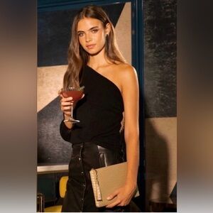 Chic and classy Virginia Wolf gold woven clutch